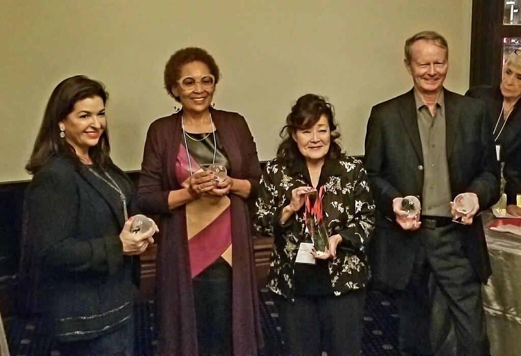 La-Verna Fountain (second from left) accepting the International Real Estate Federation U.S. Chapter’s (FIABCI-USA) annual Grand Prix of Real Estate Awards for the University’s development in Manhattanville. La-Verna stands in with other award winners, all holding glass awards.