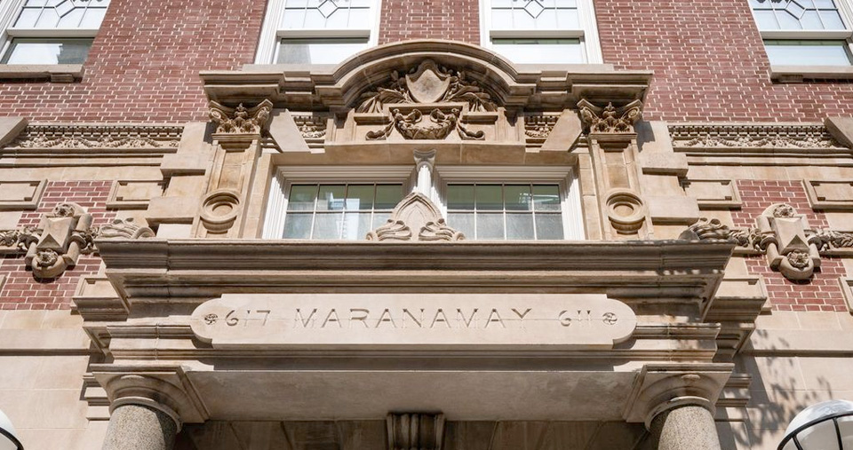 A close up of the restored facade of 611 W. 112th Street, which says Maranamay on it. 