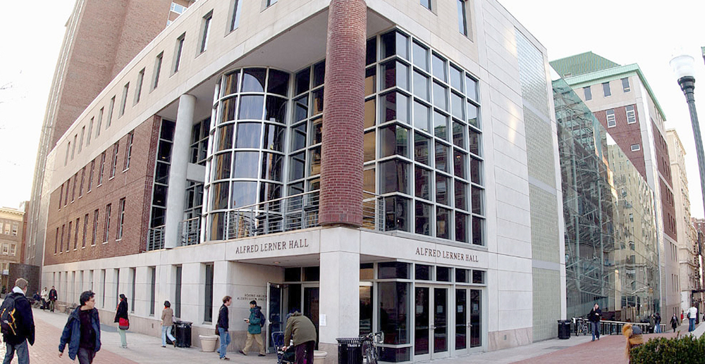 The campus entrance to Lerner Hall with people walking by