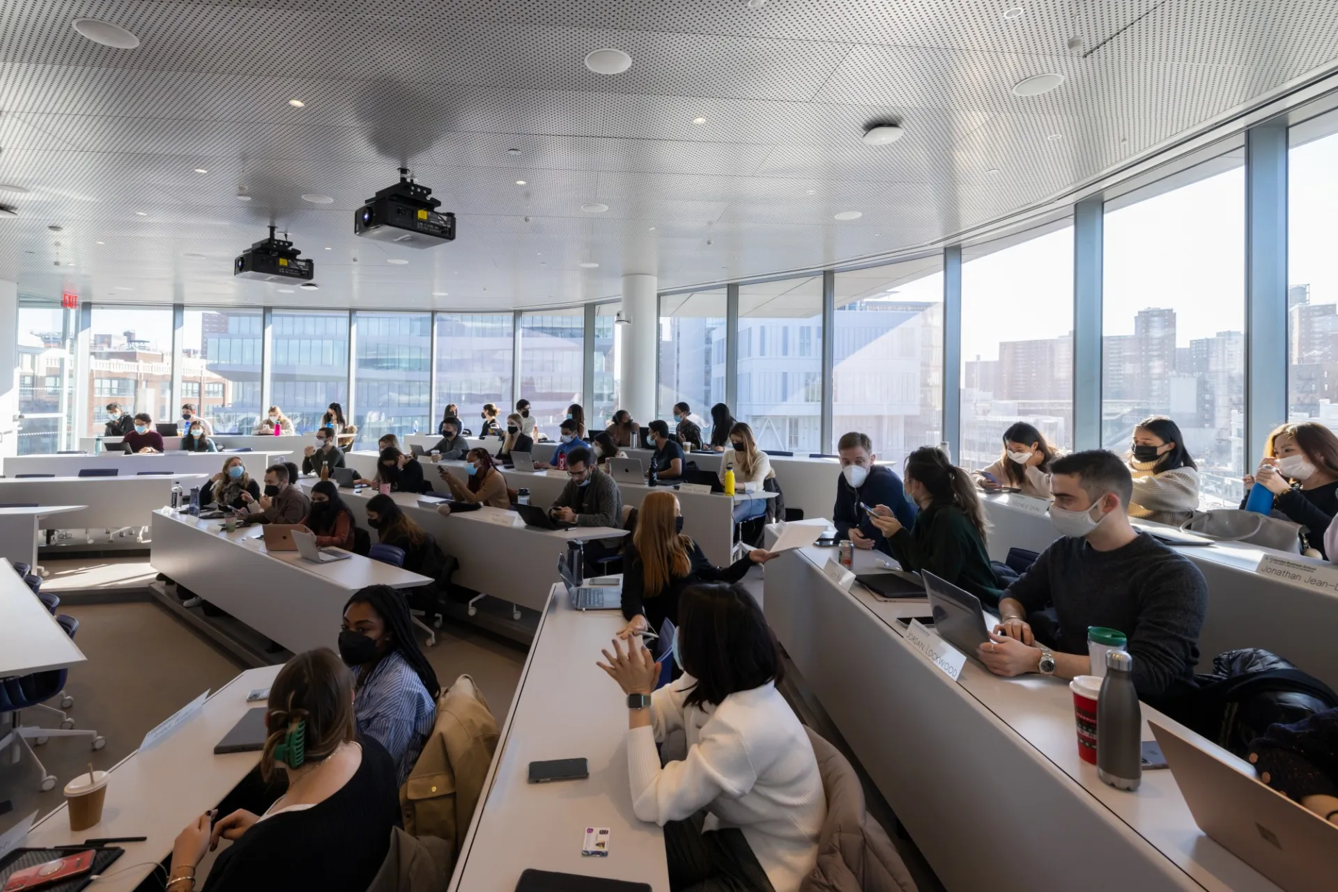 A classroom at Columbia Business School filled with students.