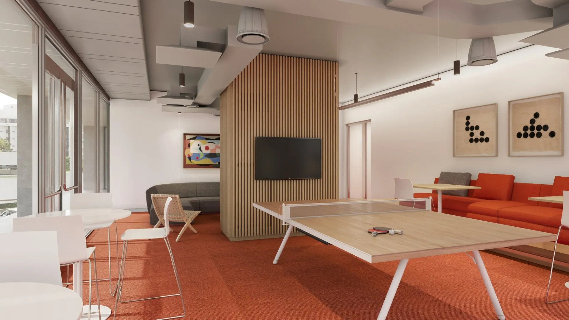 A rendering of a gameroom at 600 W. 125th Street that has a table tennis board, a tv, chairs, and a sofa.