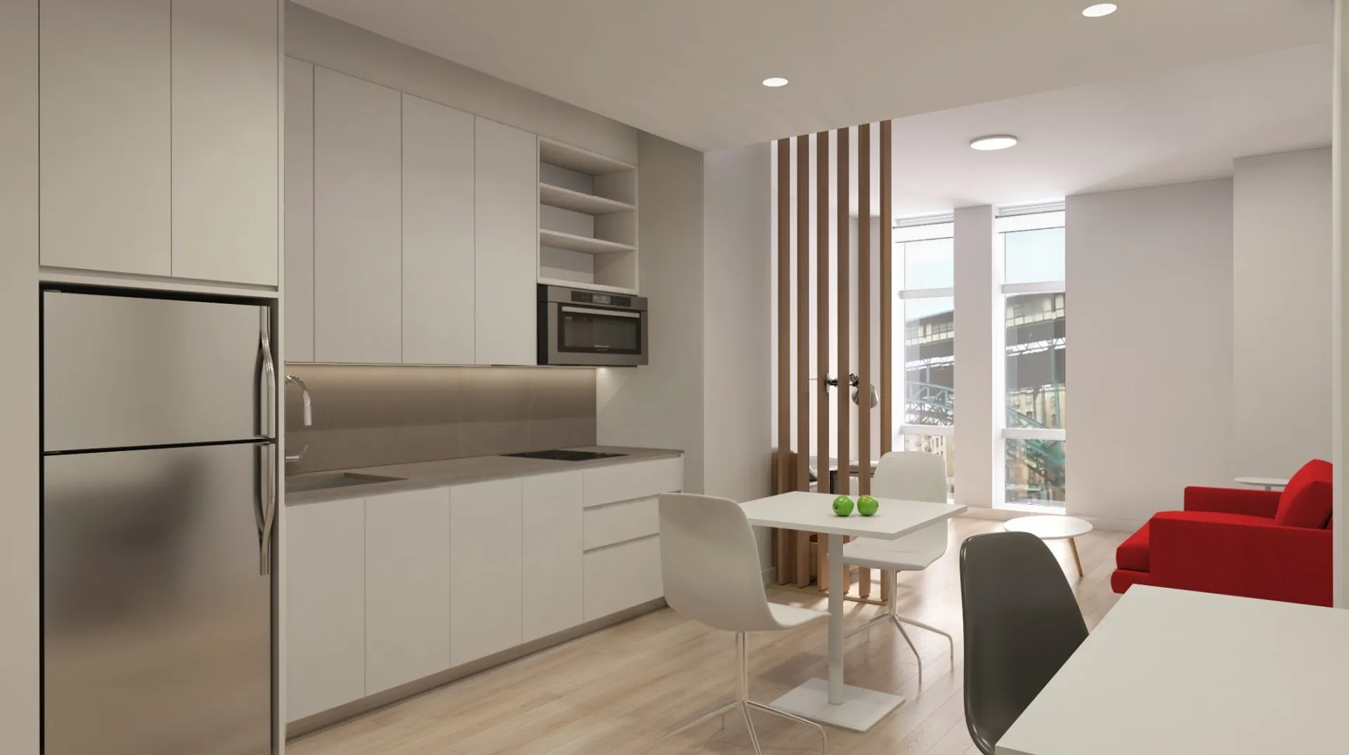 A rendering of a studio unit for graduate students with white cabinetry in the kitchen, a red sofa, a wood dividing wall, and white tables.