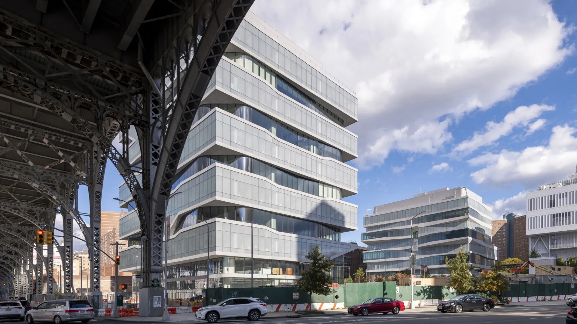 A view of the completed Columbia Business School buildings from across the street, underneath the viaduct.