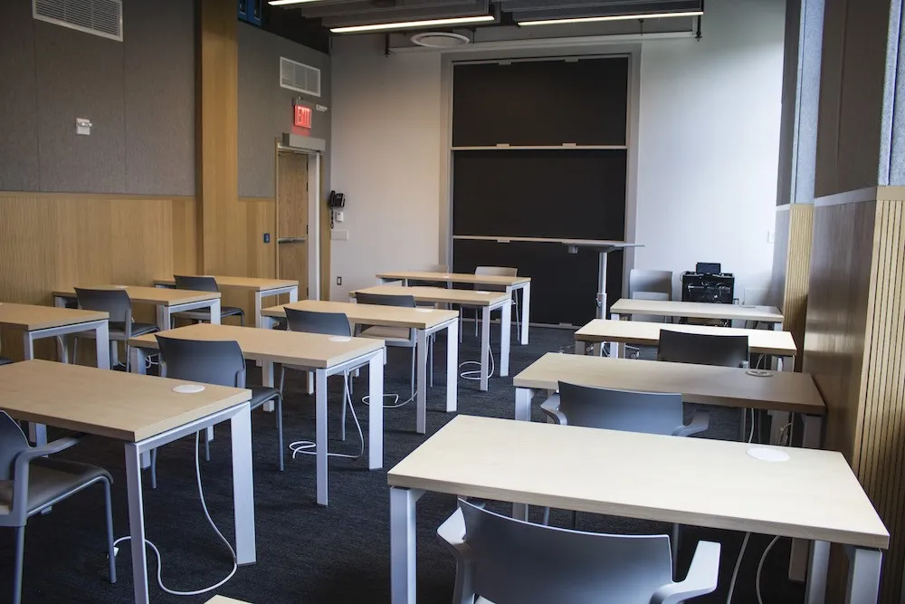 Rows of individual wooden desks