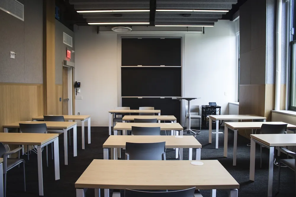 Rows of individual wooden desks